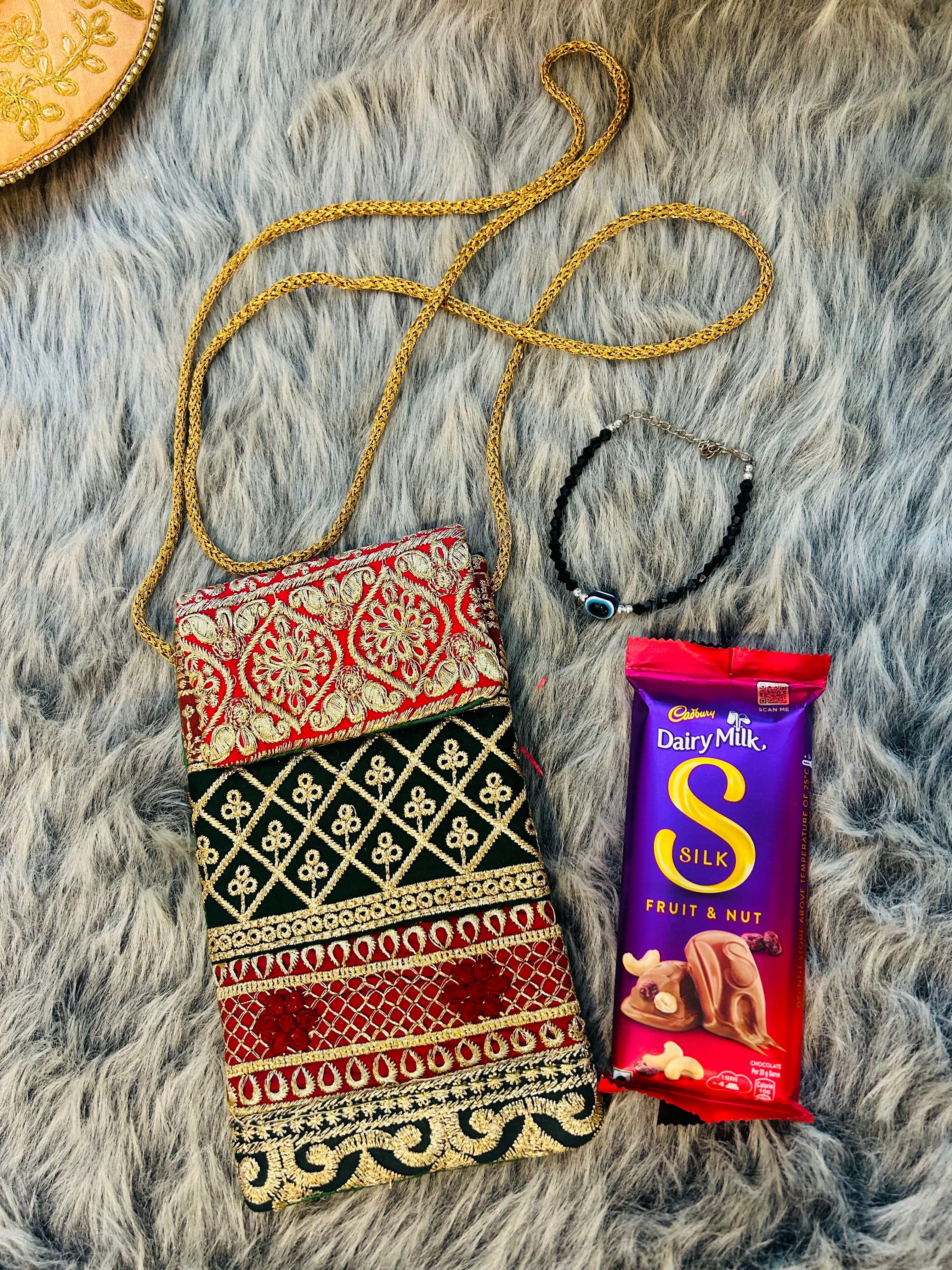 Elegant Gift Hamper – Evil Eye Bracelet & Chocolate in a Traditional Mobile Sling Bag | Birthday, Anniversary & Wedding Favor