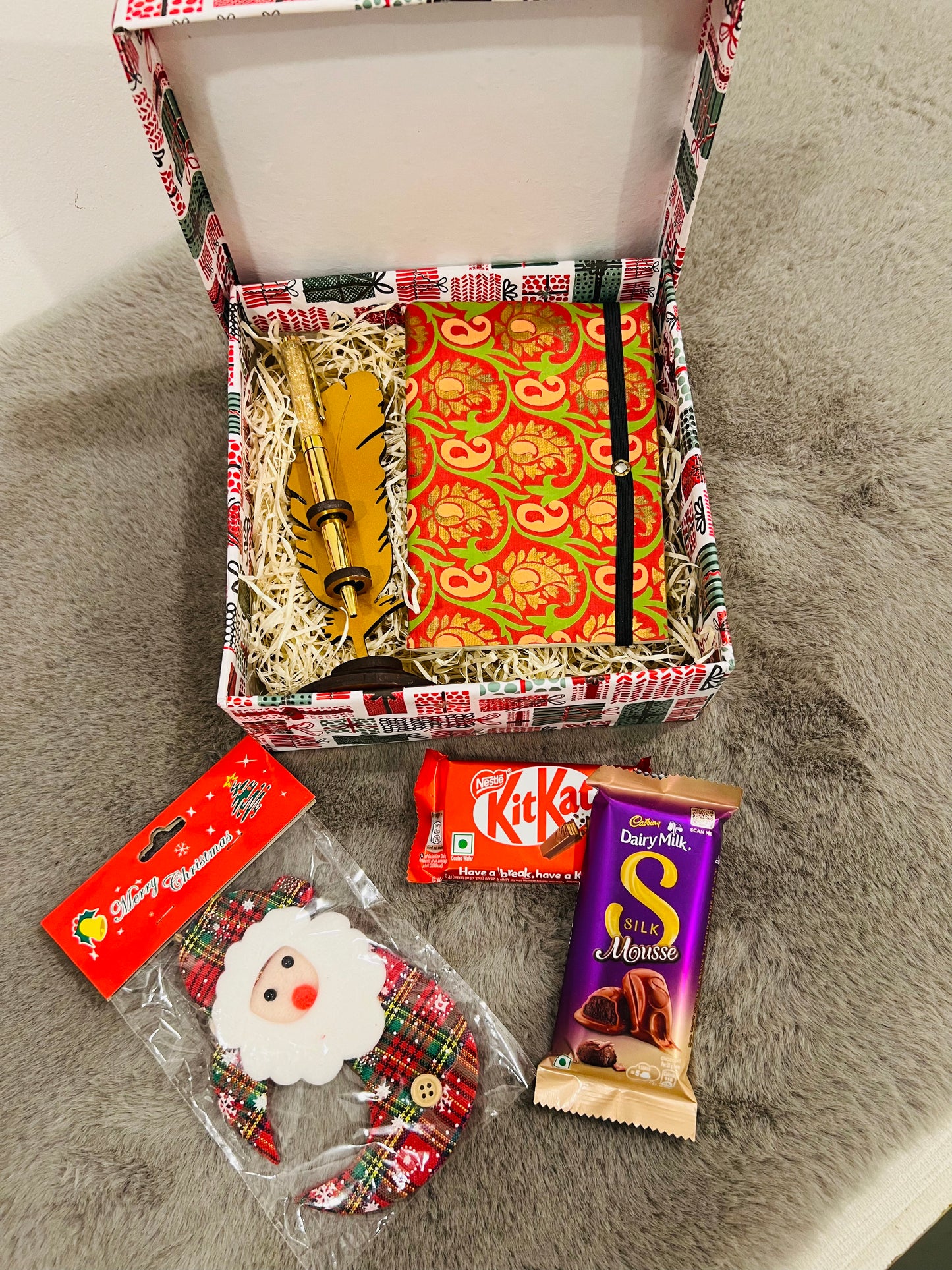 Christmas Gift Hamper in Festive Paper Box – Handmade Notebook, Designer Pen, Dairy Milk Silk Mousse, Kit Kat & Christmas Tree Hanging