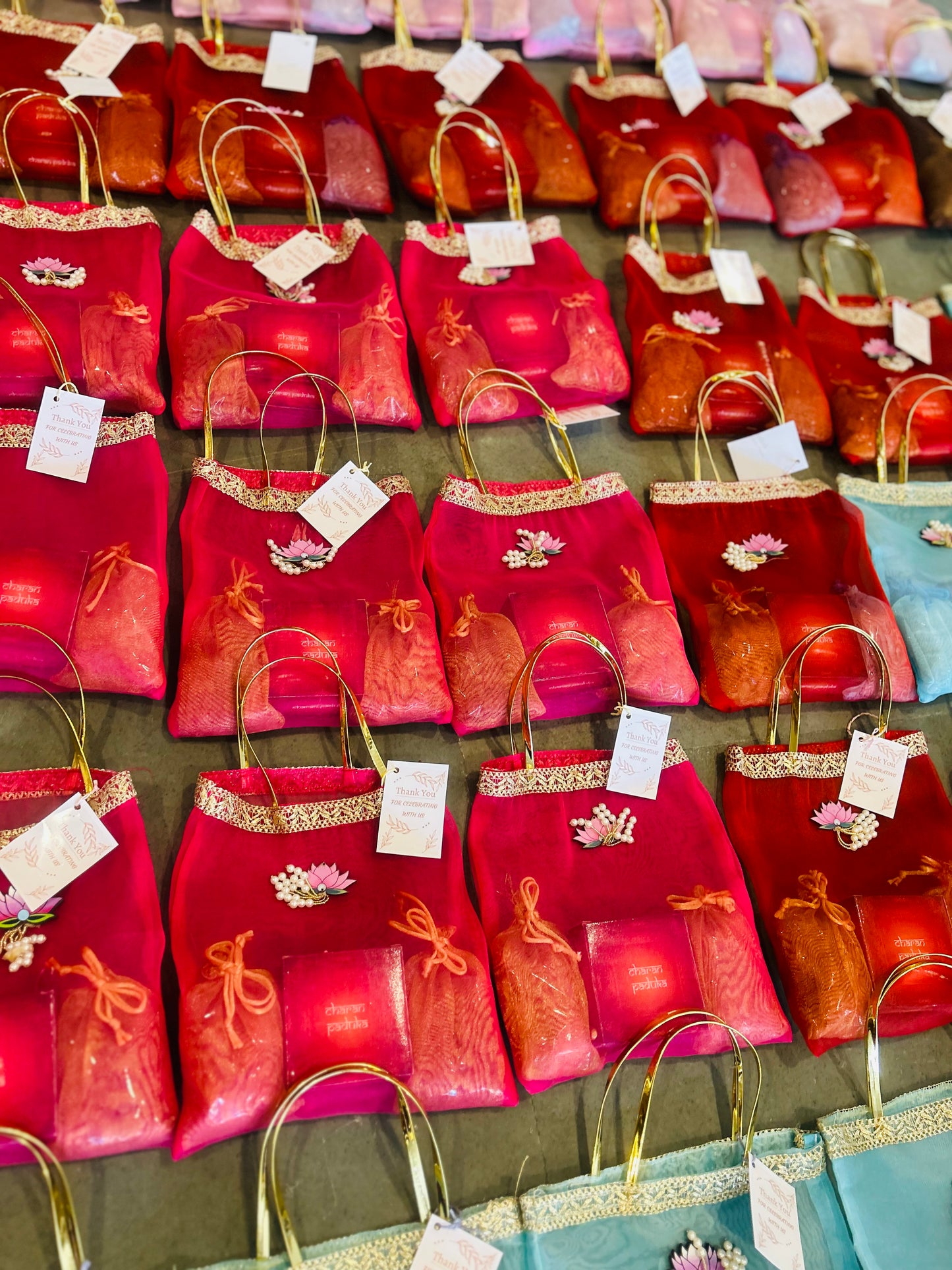 Premium Return Gift Hamper with Almonds, Raisins, Laxmi Charan Paduka Gift Box in Lotus Decorated Tissue Bag