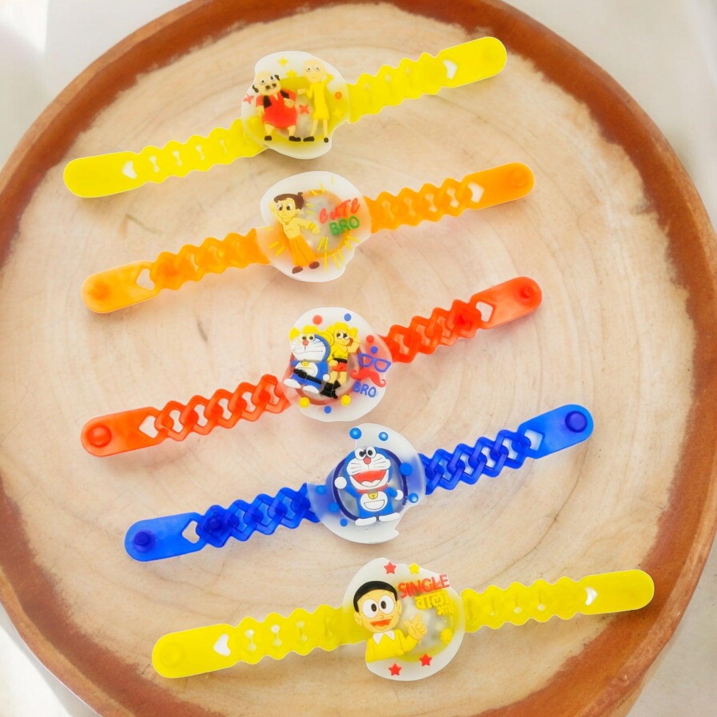 Wrap Shap Kids Rakhi - Multi Characters Light Rakhi (A) with Doremon, Motu Patlu, Pikachu & More, Comes with Roli Chawal