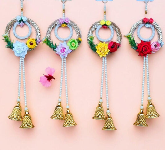 Handcrafted decorative door hanging with flowers and bell