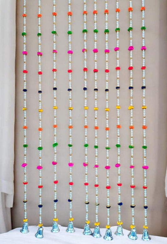 Handcrafted vibrant pom pom and pearl decorative wall hanging