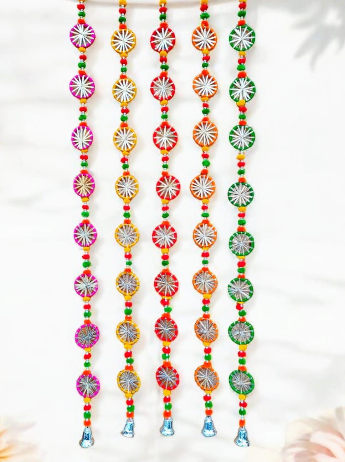 Festive decorative pom pom and bell hanging for home décor