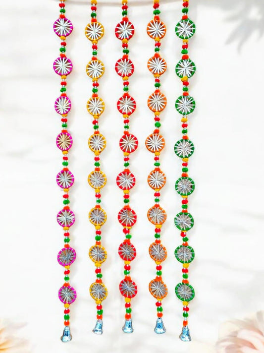 Festive decorative pom pom and bell hanging for home décor