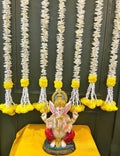 Handcrafted festive flower hanging for home décor