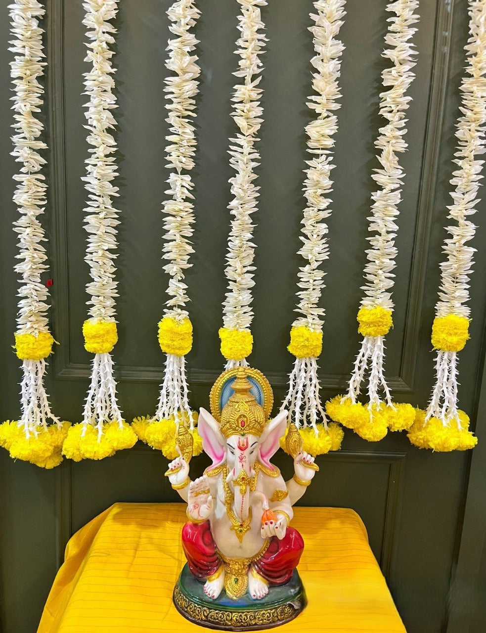 Handcrafted festive flower hanging for home décor