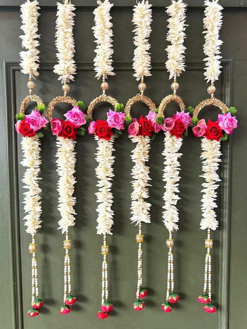 Decorative wall and door hanging with vibrant artificial flowers