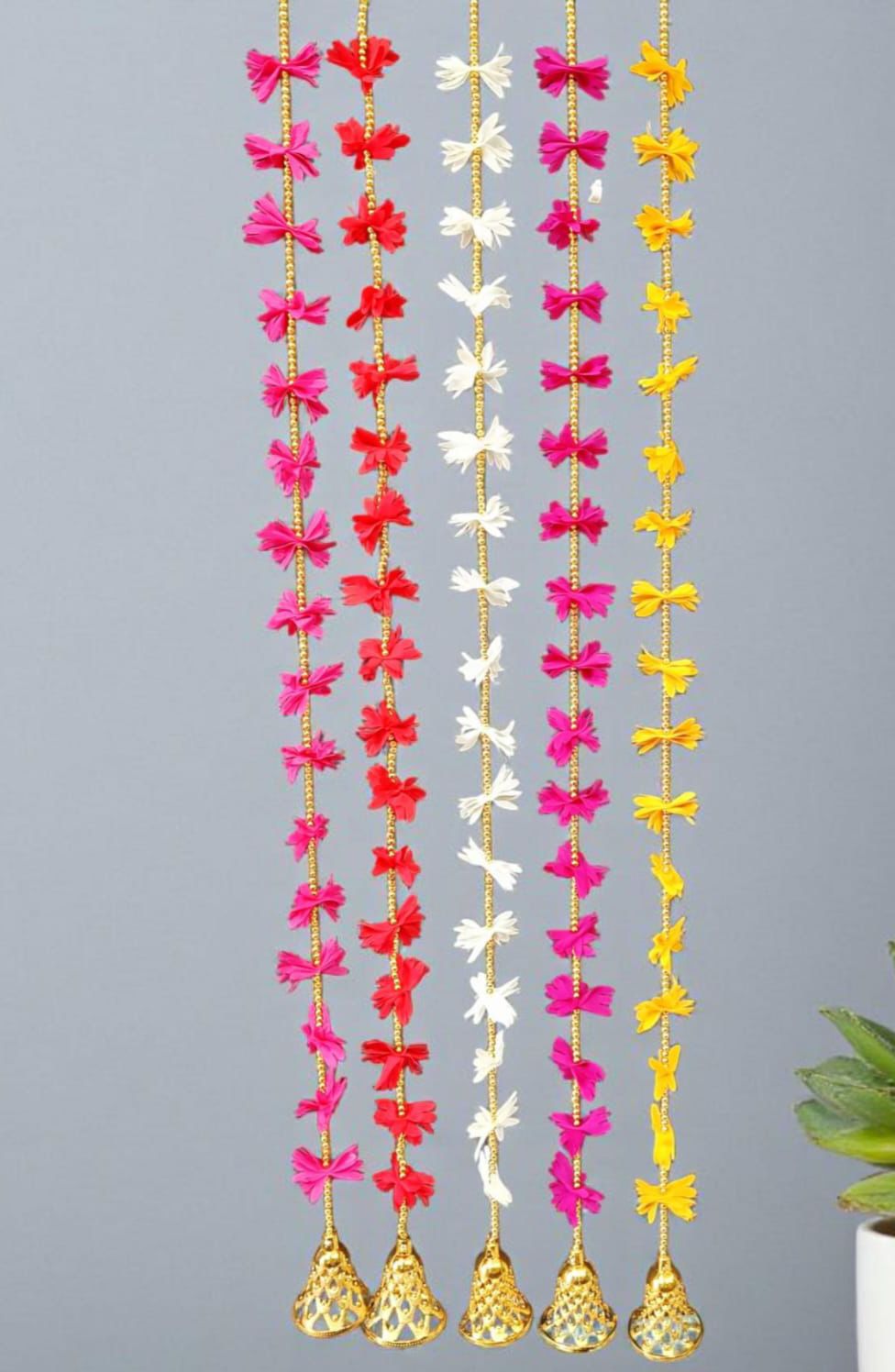 "Traditional toran style hanging with beads and bells"