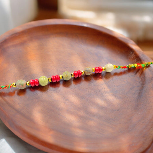 Wrap Shap G9613 Rakhi with Multicolor Beads - Includes Roli Chawal