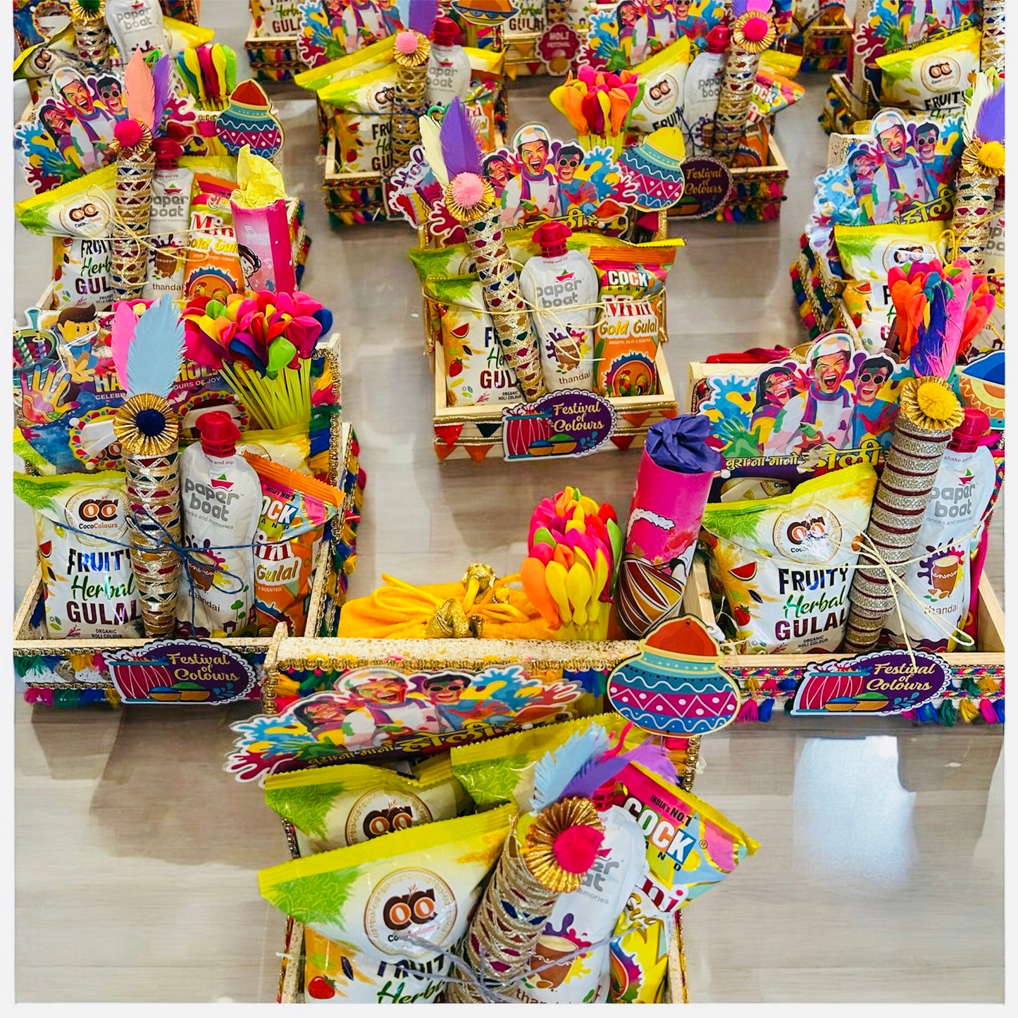 Holi Celebration Gift Hamper – Traditional Sweets & Colors in a Pinewood Basket