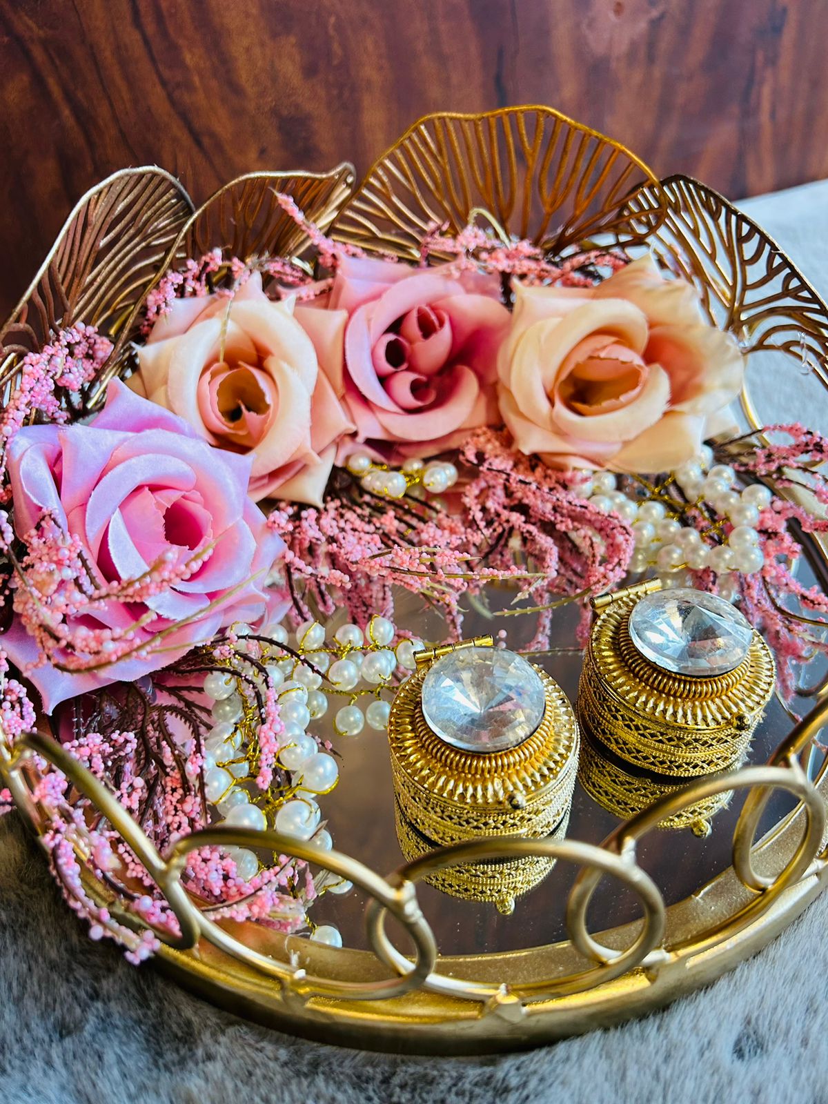 Round metal mirror engagement ring platter with pink and peach rose decoration, perfect for weddings, engagements, and proposals, elegant trousseau accessory