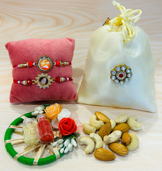 Set of 2 Guruji design rakhis featuring Jai Gurudev and spiritual Guruji motifs with Roli Chawal – by Wrap Shap.