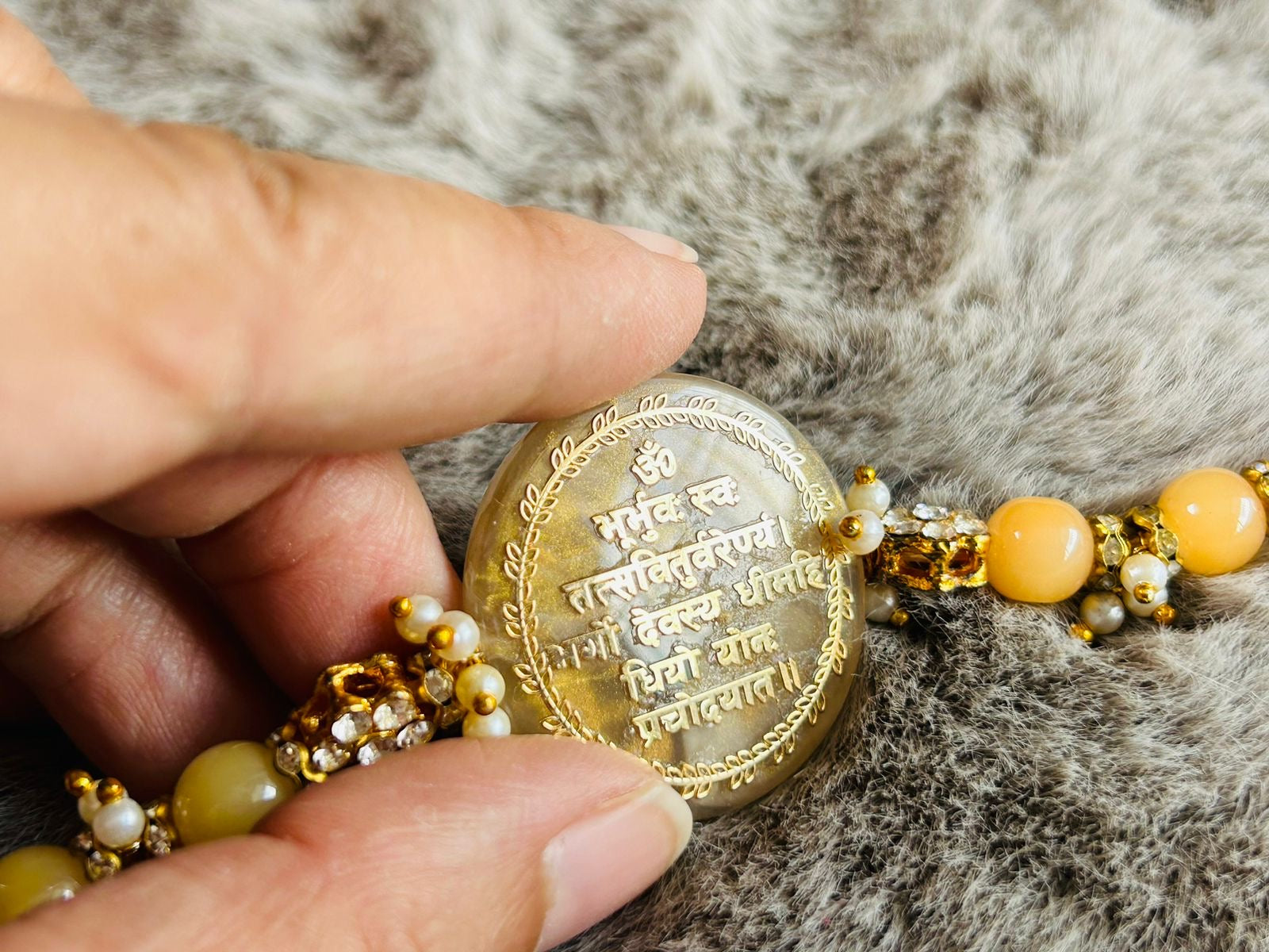 Wrap Shap Resin Rakhi with Gayatri Mantra - Model R149 with Roli Chawal