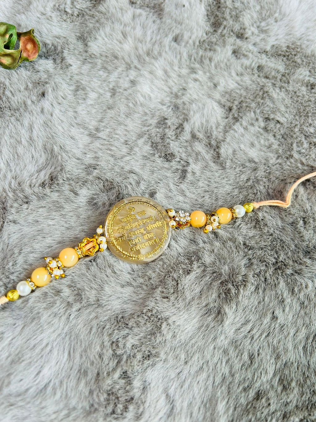 Wrap Shap Resin Rakhi with Gayatri Mantra - Model R149 with Roli Chawal