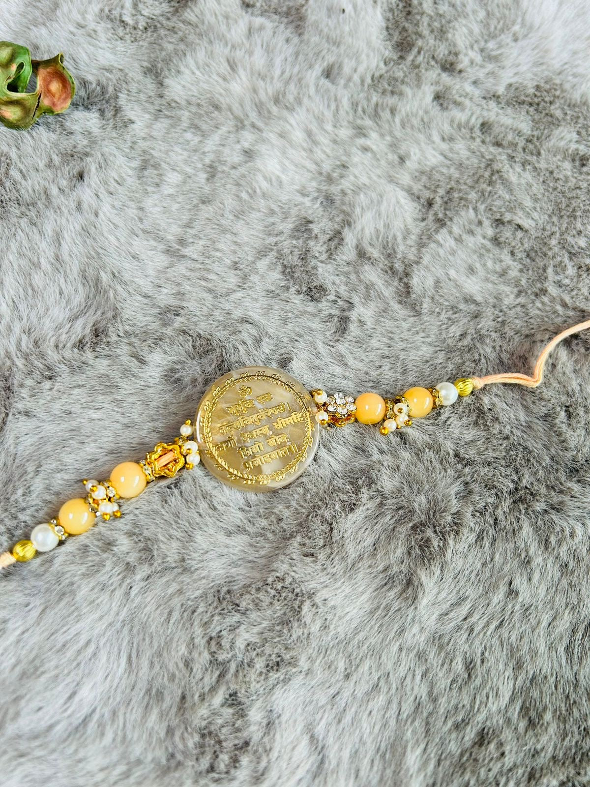 Wrap Shap Resin Rakhi with Gayatri Mantra - Model R149 with Roli Chawal