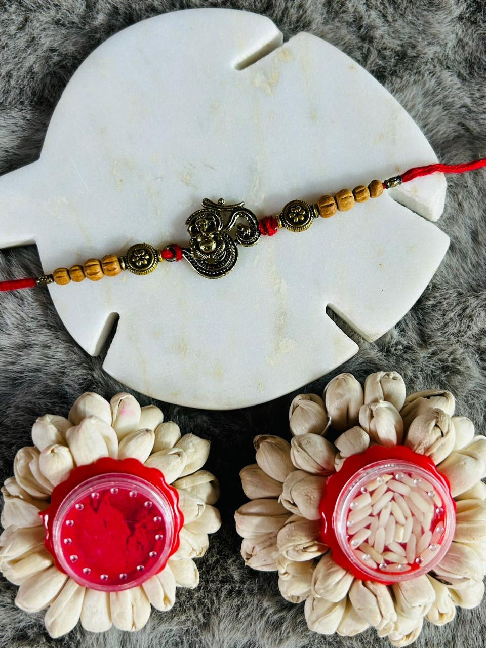 Wrap Shap Beautiful & Heavy Om Rakhi - Model AA44 with Roli Chawal