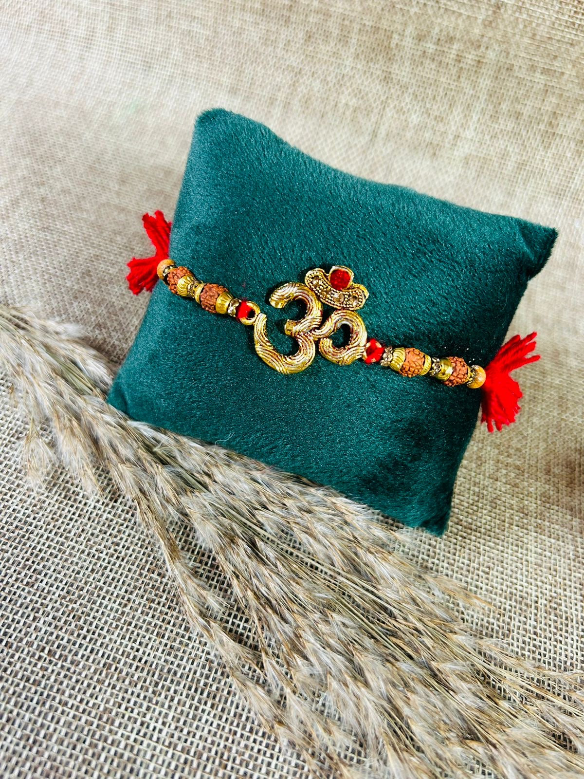 Wrap Shap Beautiful & Heavy Om Rakhi - Model AA44 with Roli Chawal
