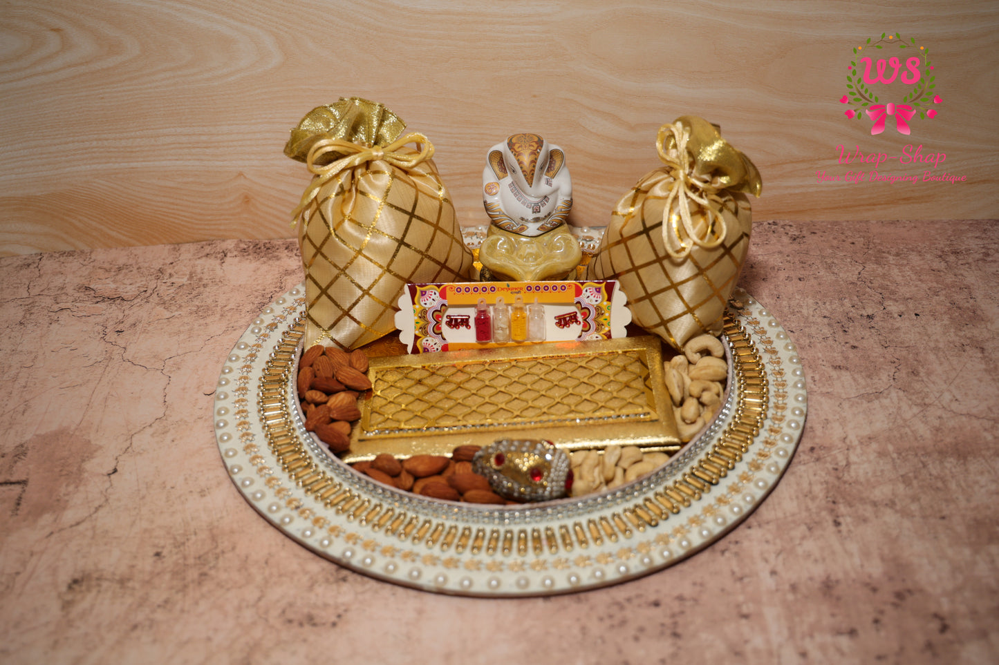 Buy family Rakhi hamper with Bhaiya Bhabhi Rakhi, dry fruits, Ganpati, & pooja thali. Send rakhi to India. Bulk Rakhi gifts from Wrap Shap.