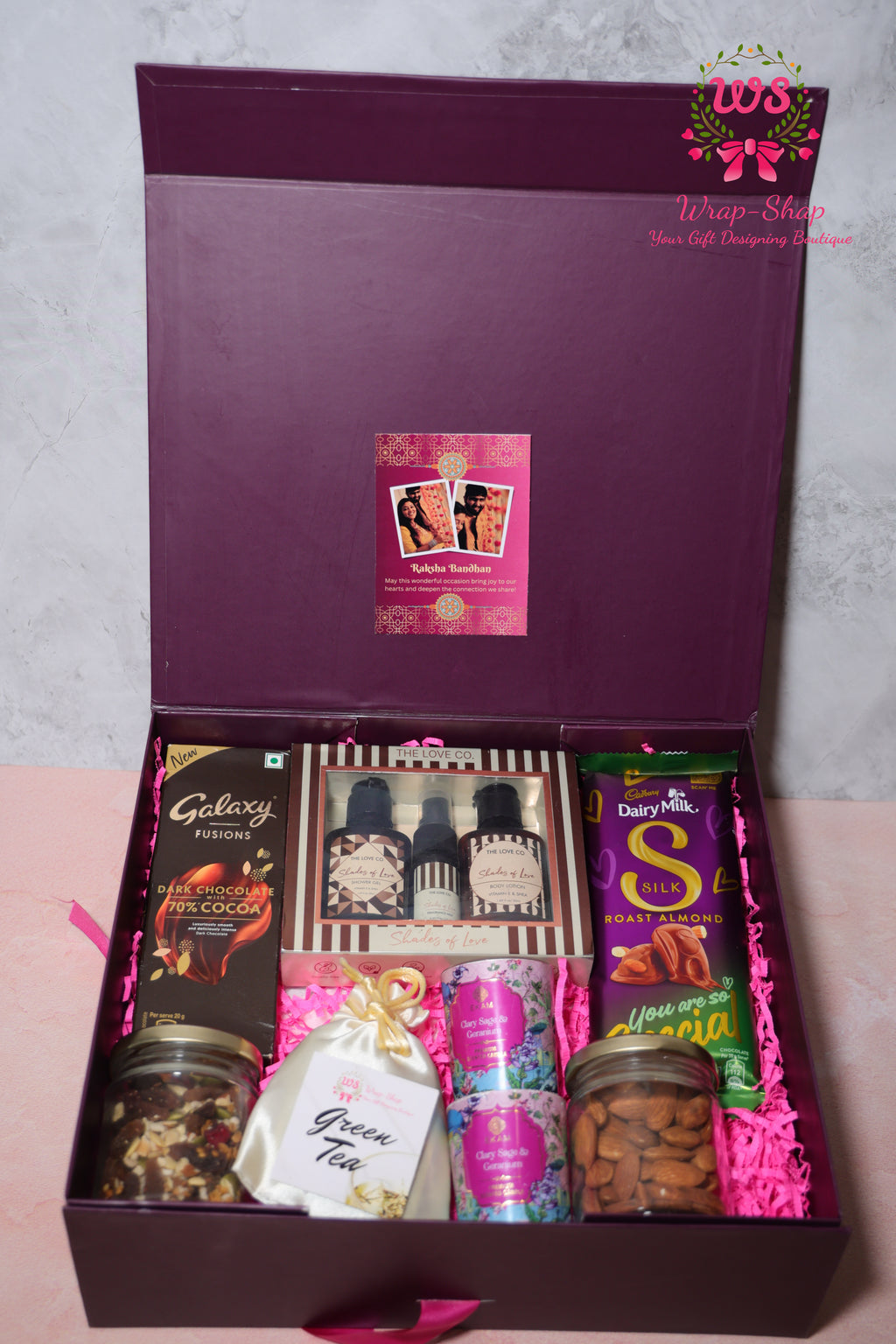 Luxury Bhaiya Bhabhi Rakhi Gift Hamper with Love Co Body Care, Dry Fruits, Candles, Chocolates & Personalized Photo Tag | Wrap Shap