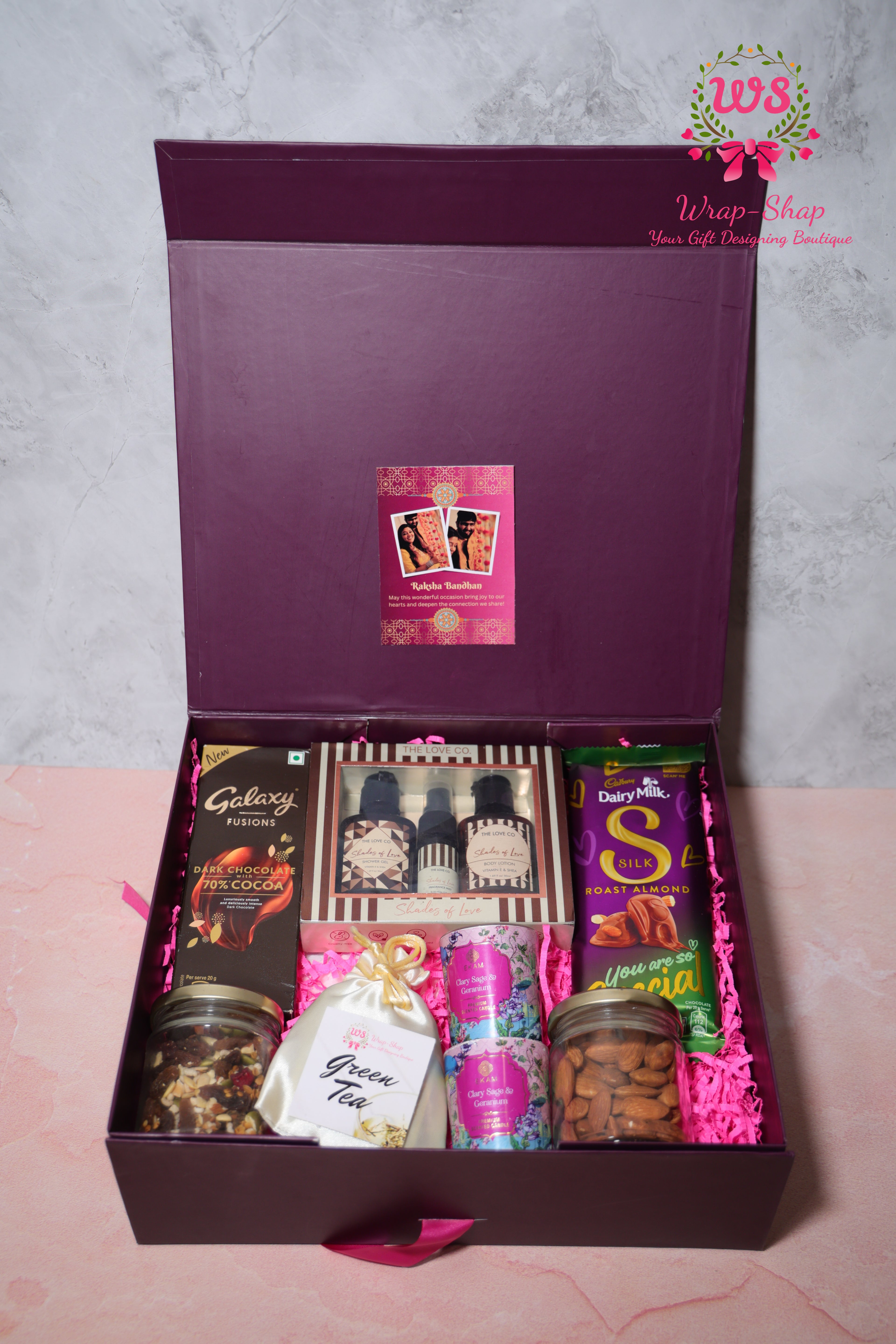Luxury Bhaiya Bhabhi Rakhi Gift Hamper with Love Co Body Care, Dry Fruits, Candles, Chocolates & Personalized Photo Tag | Wrap Shap