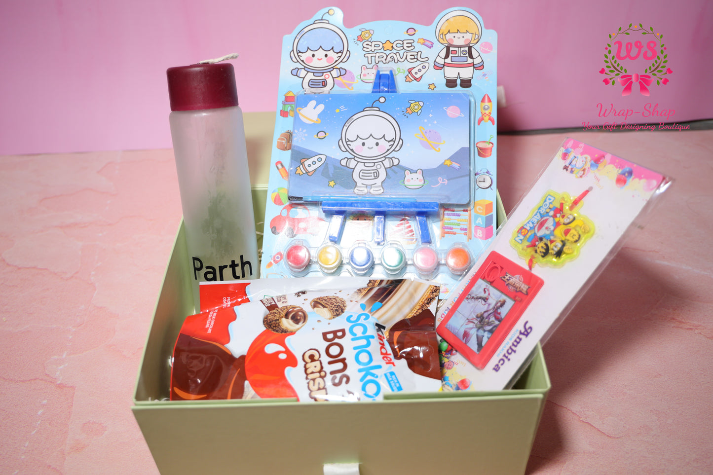 Kids Rakhi Gift Hamper with Painting Kit, Personalized Glass Bottle & Kinder Joy in Gift Box | Wrap Shap