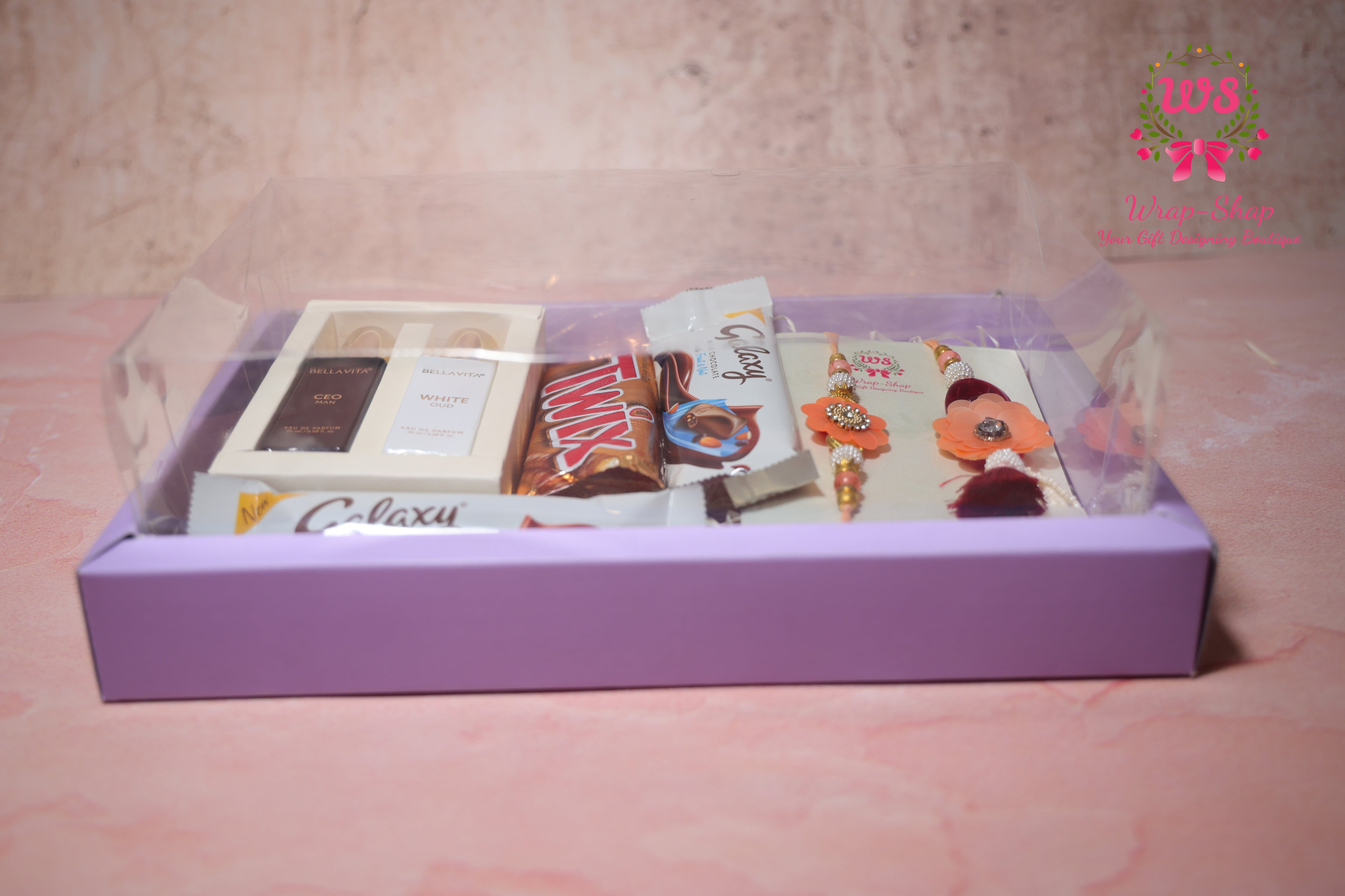 Bhaiya Bhabhi Rakhi Hamper with Men & Women Perfume Gift Set, Chocolates & Transparent Gift Box | Wrap Shap