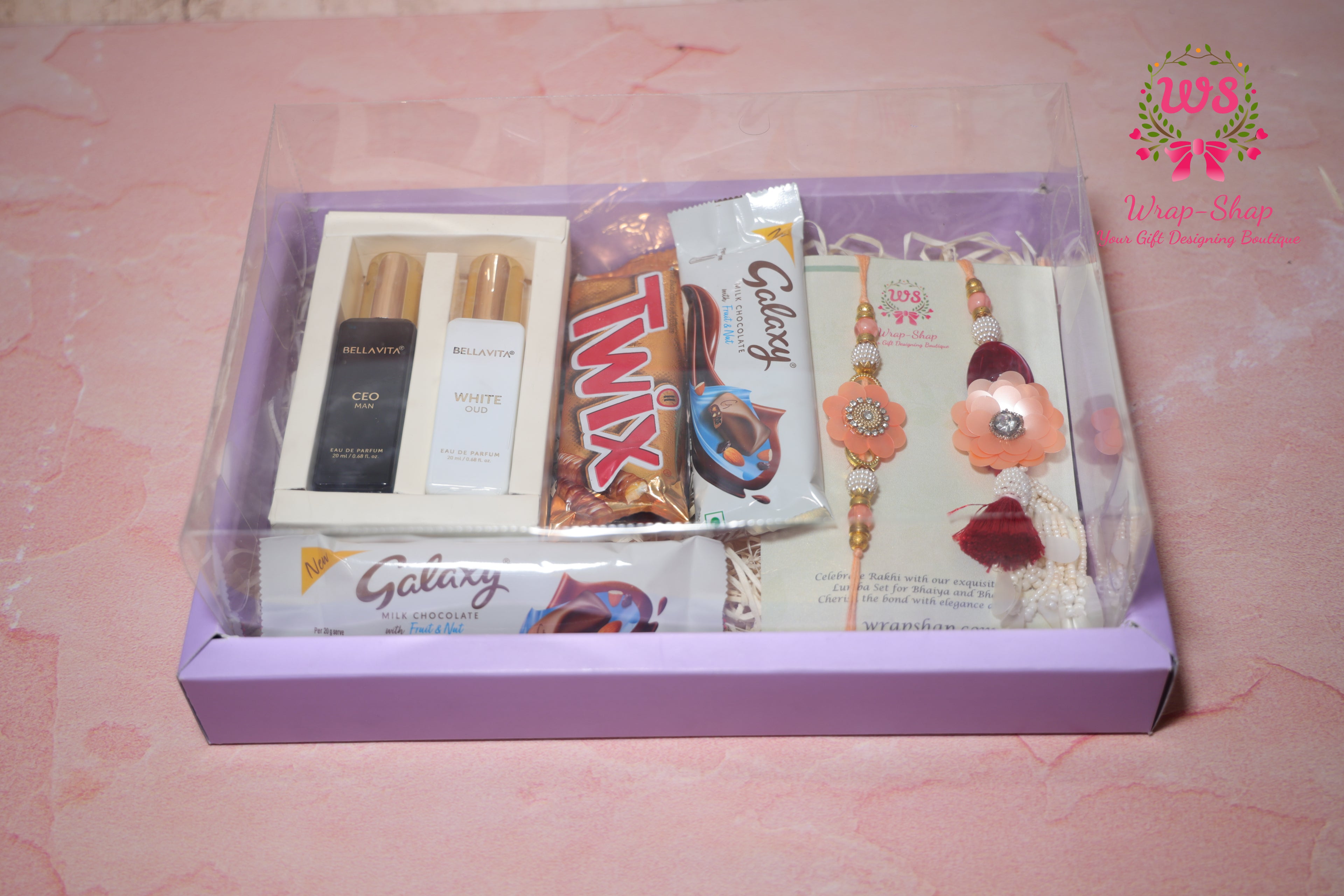 Bhaiya Bhabhi Rakhi Hamper with Men & Women Perfume Gift Set, Chocolates & Transparent Gift Box | Wrap Shap