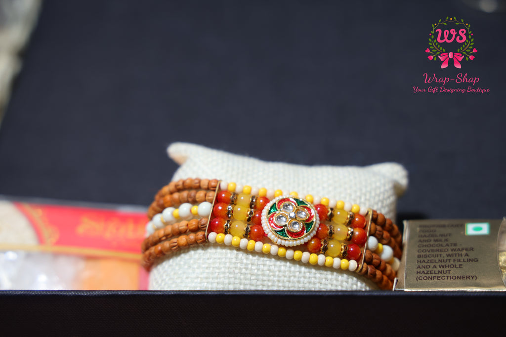 Rakhi Hamper with Customized Steel Bottle, Notebook, Pen, Card Holder, Keychain, Ferrero Rocher & Rakhi in Rigid Gift Box | Wrap Shap