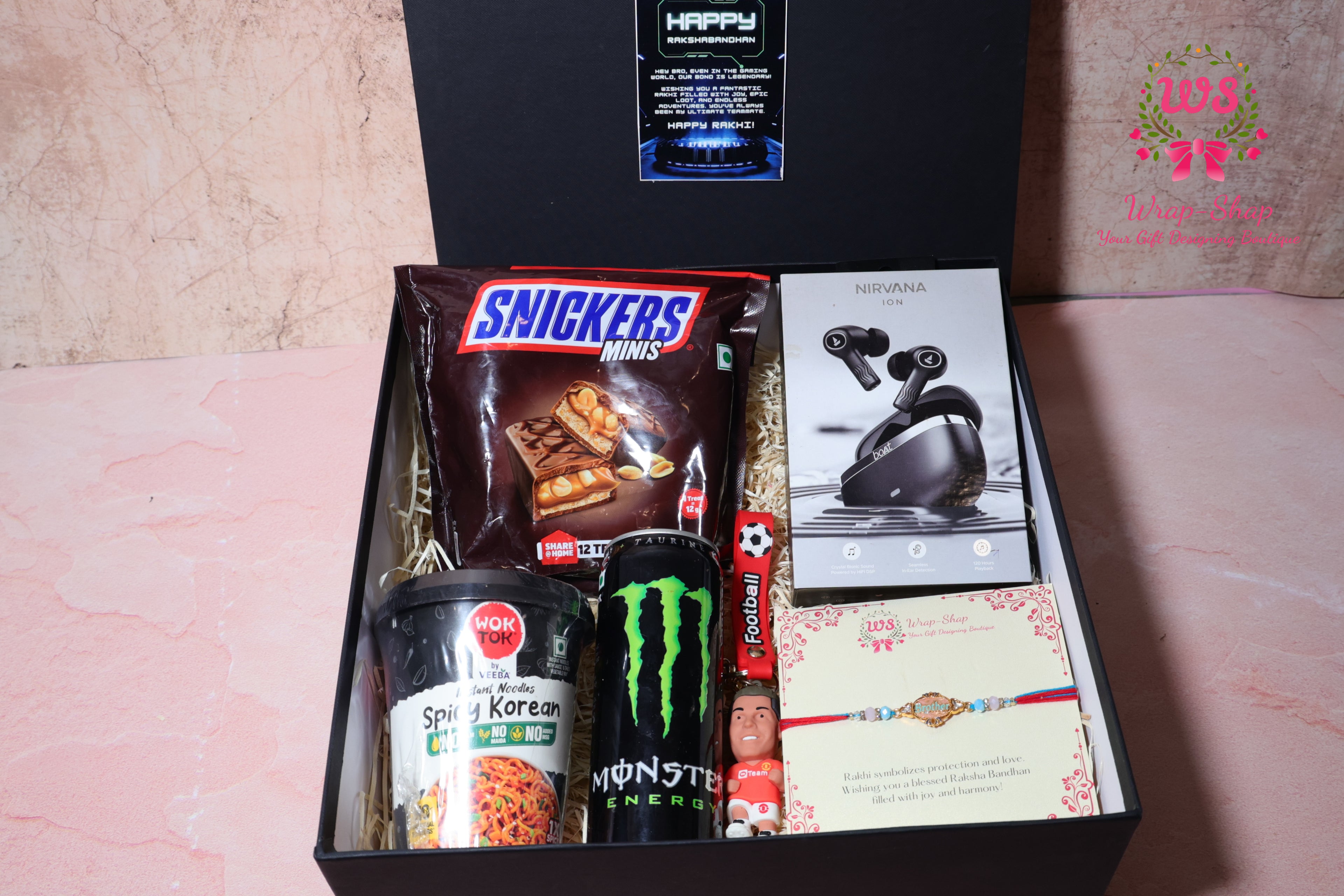Gaming Rakhi Hamper with Boat Earpods, Korean Noodles, Energy Drink & Football Keychain in Rigid Gift Box | Wrap Shap