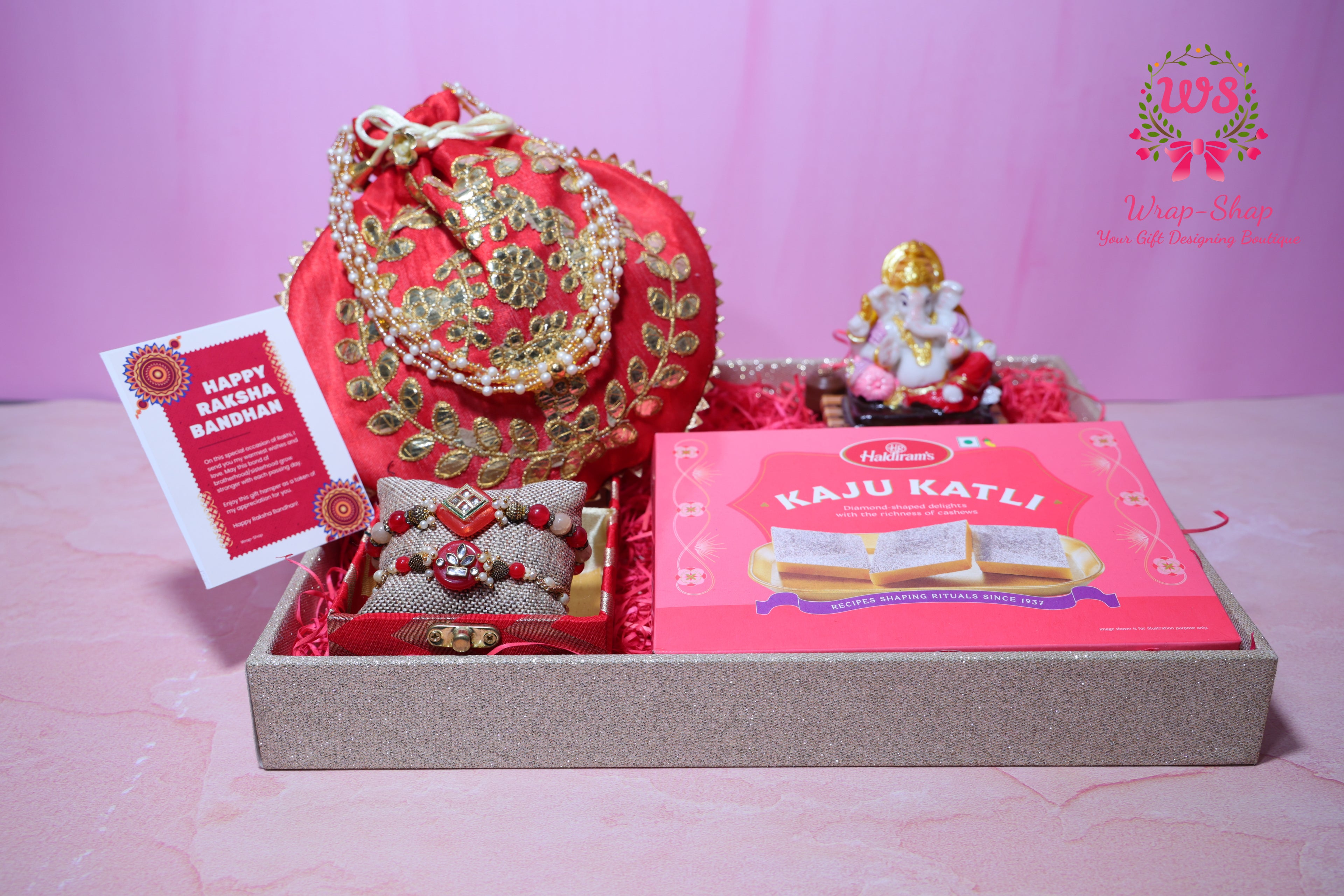 Bhaiya Bhabhi Rakhi Gift Hamper with Kaju Katli, Ganpati Idol, Potli & Tray | Raksha Bandhan Gift Box by Wrap Shap