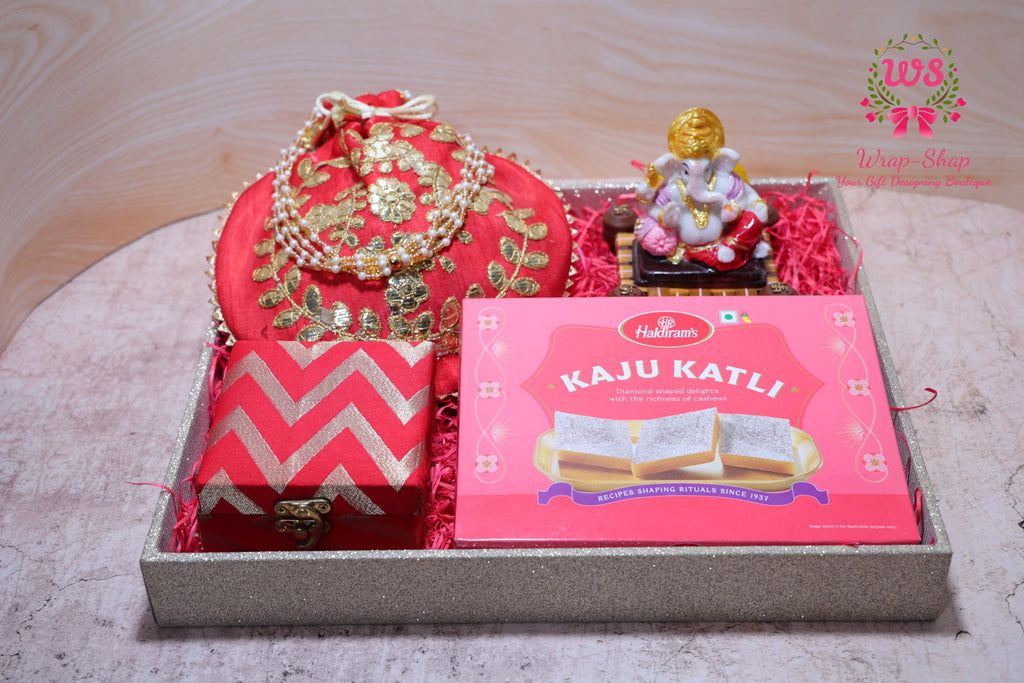 Bhaiya Bhabhi Rakhi Gift Hamper with Kaju Katli, Ganpati Idol, Potli & Tray | Raksha Bandhan Gift Box by Wrap Shap