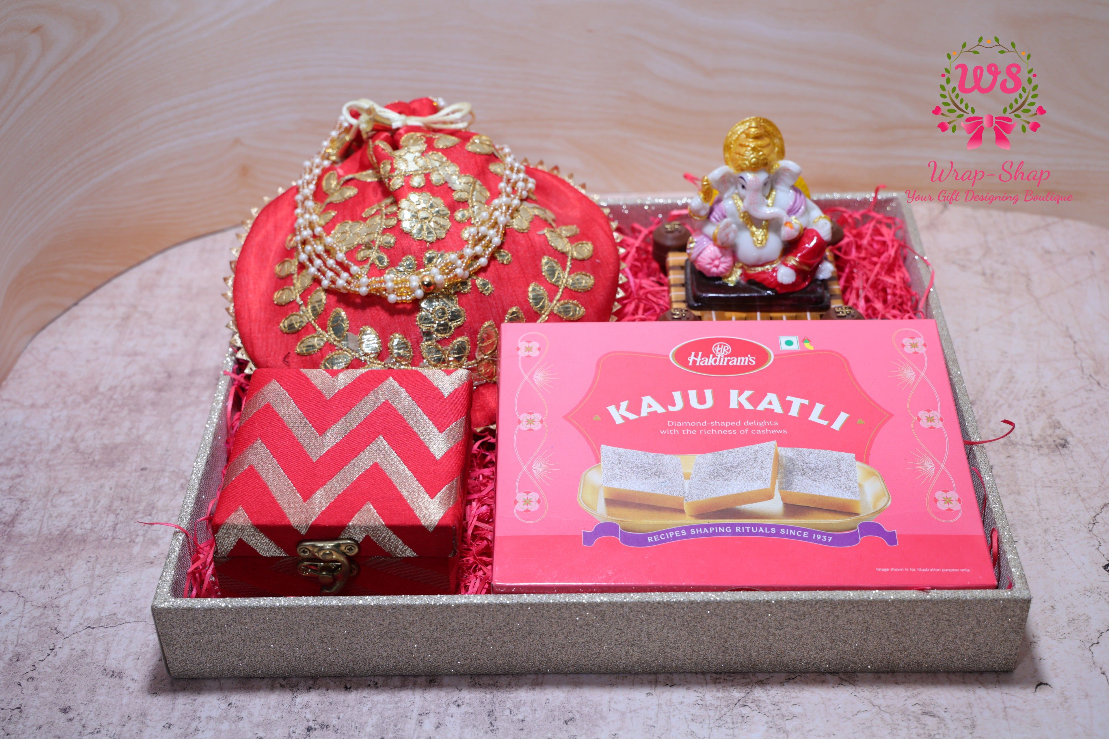 Bhaiya Bhabhi Rakhi Gift Hamper with Kaju Katli, Ganpati Idol, Potli & Tray | Raksha Bandhan Gift Box by Wrap Shap
