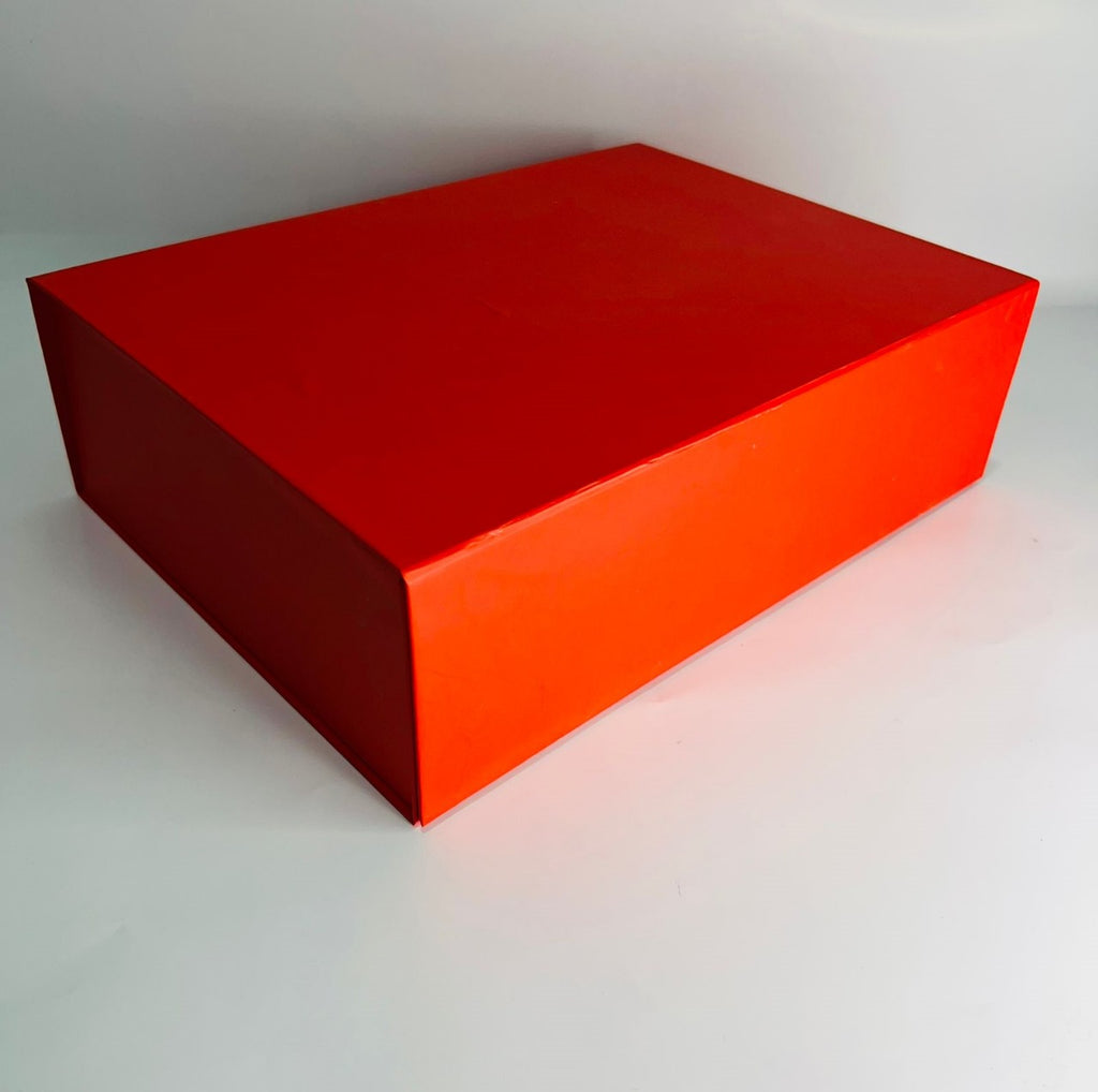 Red rectangular magnetic gift box box on a white background 