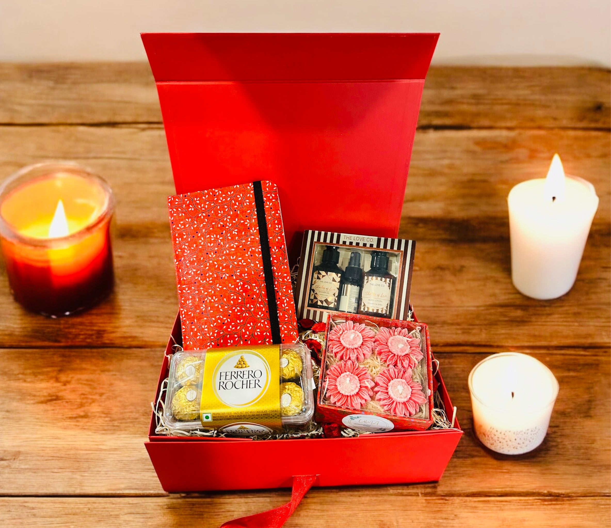 Luxury Gift Hamper with Handmade Notebook, Ferrero Rocher Chocolates, Handmade Candles & The Love Co. Body Care Set – Ideal for Women’s Day, Birthday & Anniversary Gifting.