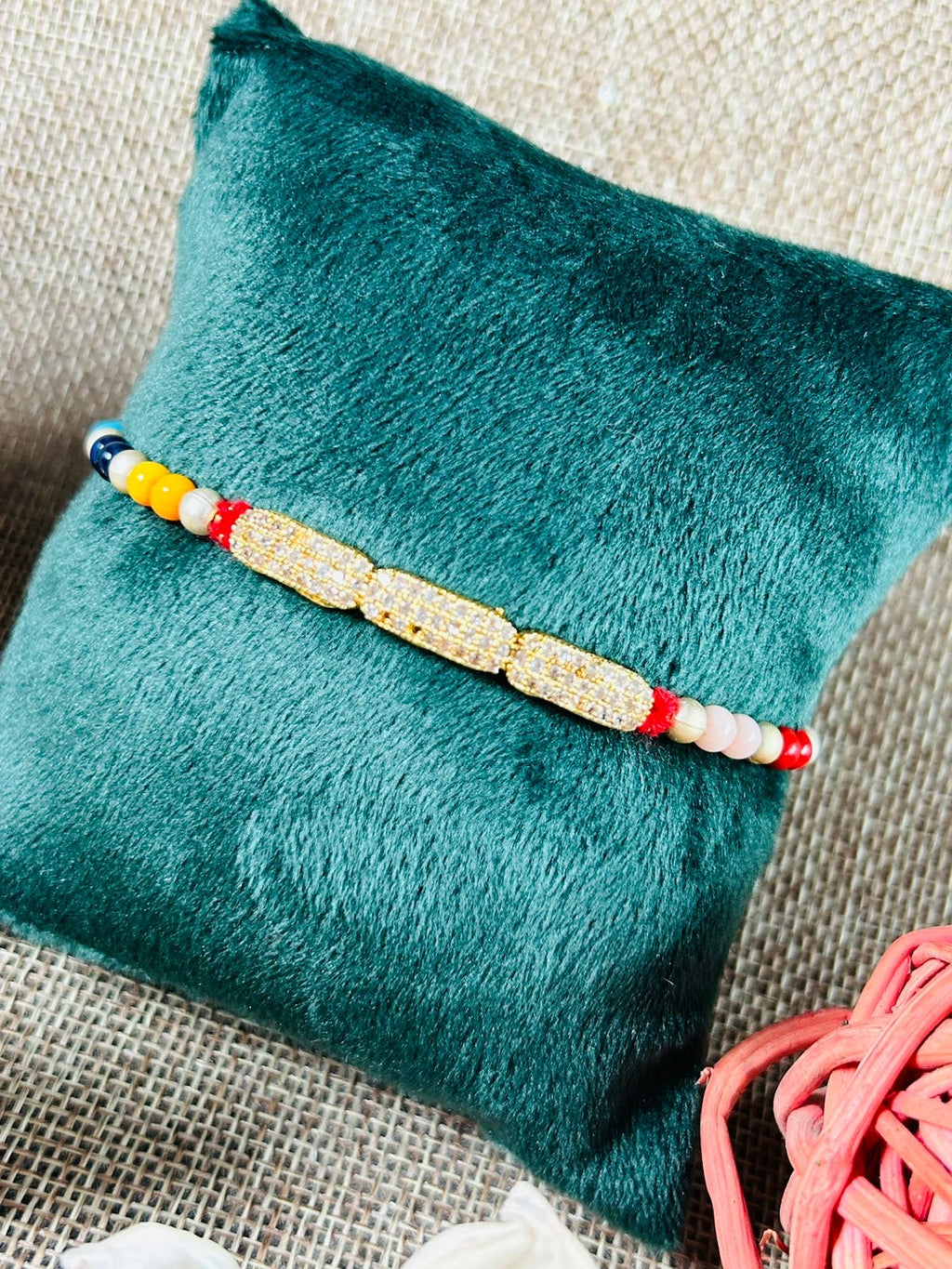 Wrap Shap Sleek AD Rakhi with Colorful Beads and Roli Chawal - Elegant Festive Delight