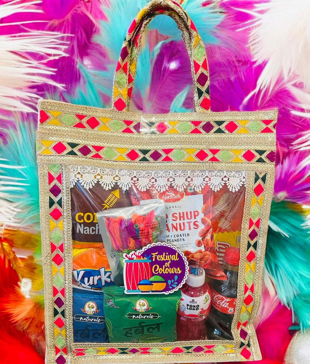 Holi Celebration Gift Hamper – Gulal, Snacks, Drinks & Holi T-Shirt in a Decorative Jute Bag