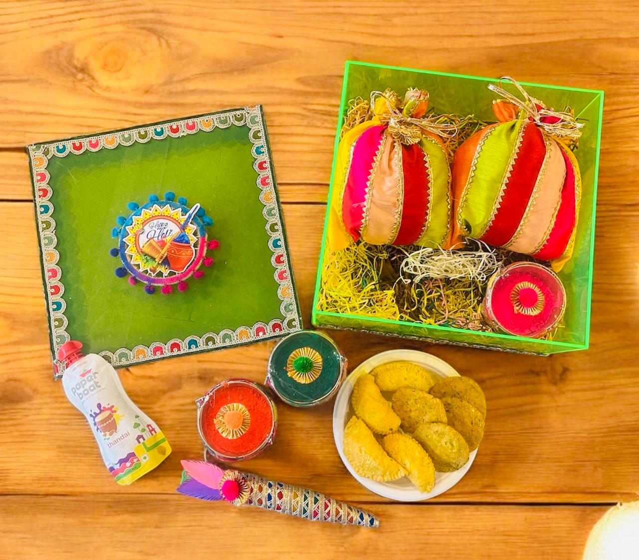 Luxury Holi Gift Hamper – Gujiya, Coated Almonds, Gulal, Decorative Pichkari in Neon Acrylic Box