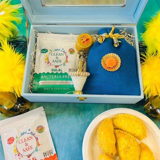 Holi Gift Hamper – Gujiya, Organic Gulal, Chandan Tikka & Balti Pichkari in a Decorative Trunk Box