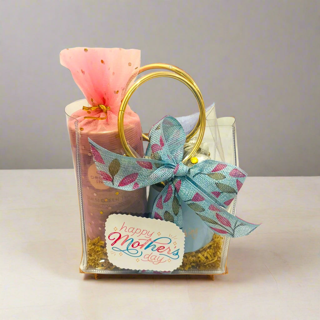 Deluxe gift hamper with green tea, personalized mug, and scrunchies in a transparent PVC bag – perfect for women’s gifting on all occasions.