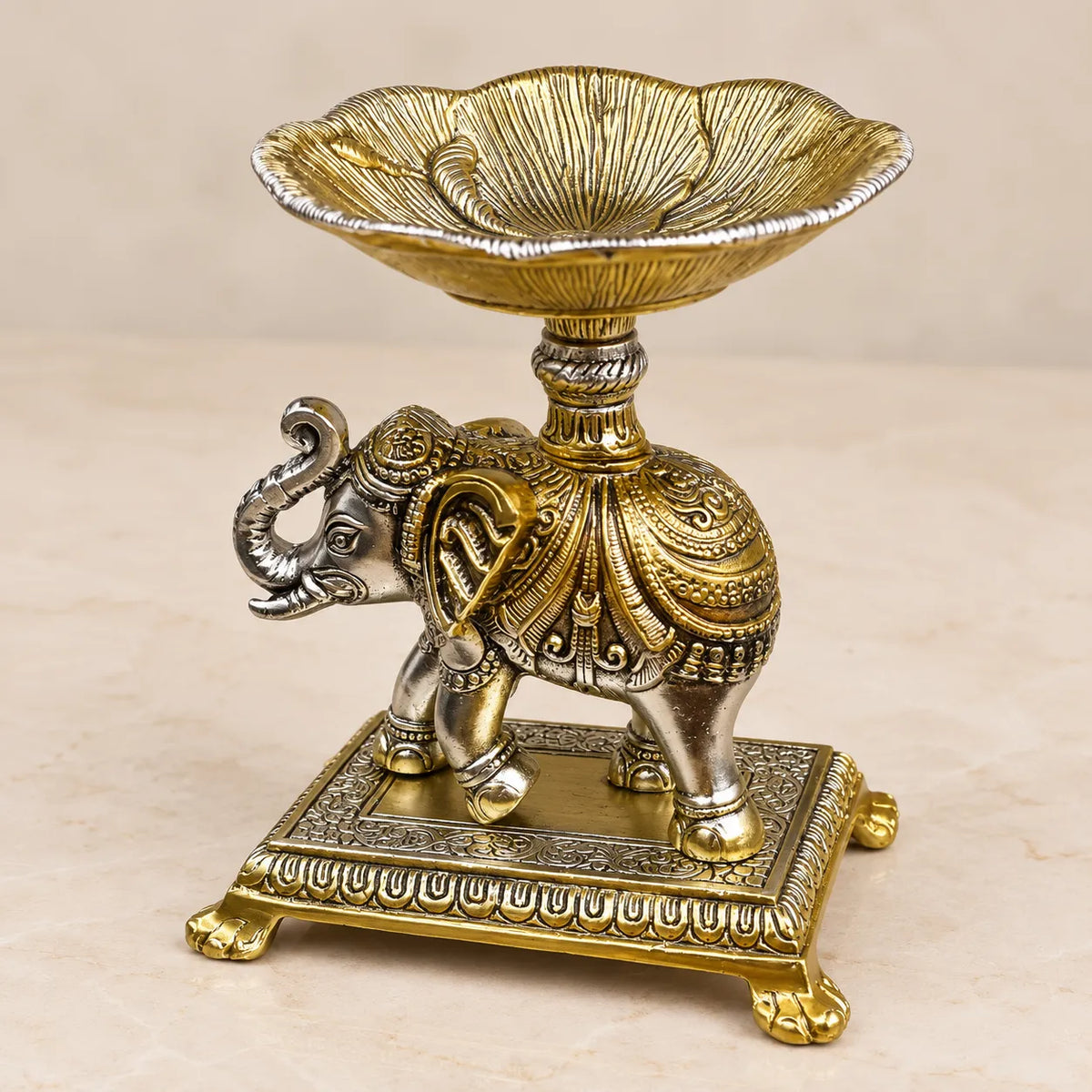 Antique silver-finish elephant diya with flower-shaped lamp bowl