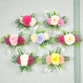 Artificial flower bunch with 2 carnations and 1 rose in assorted colors for hampers and gift décor.