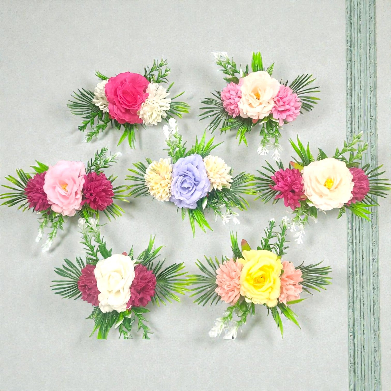 Artificial flower bunch with 2 carnations and 1 rose in assorted colors for hampers and gift décor.