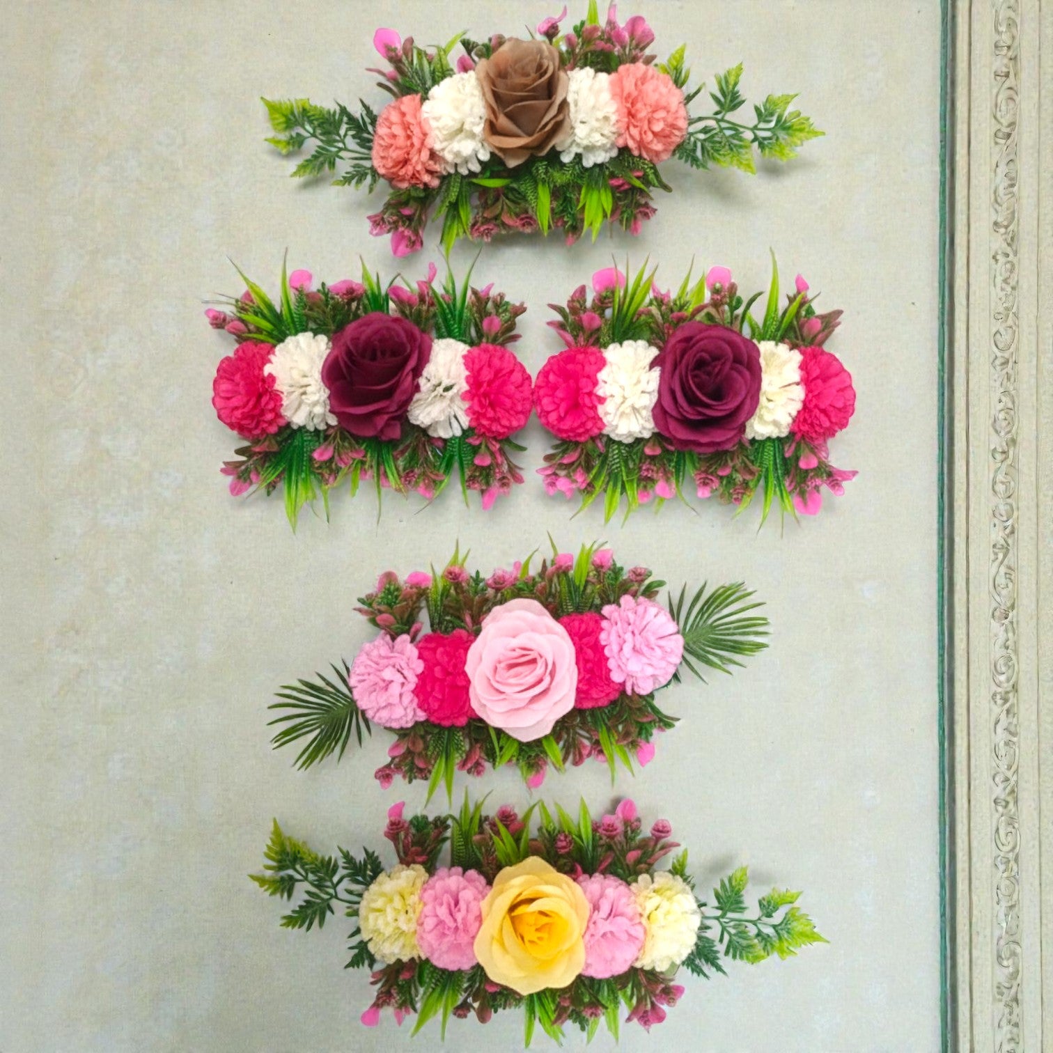 Assorted artificial flower bunch for hampers, décor and gift packaging in vibrant colors.