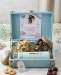 New born baby boy return gift box with cookies chocolates bottle
