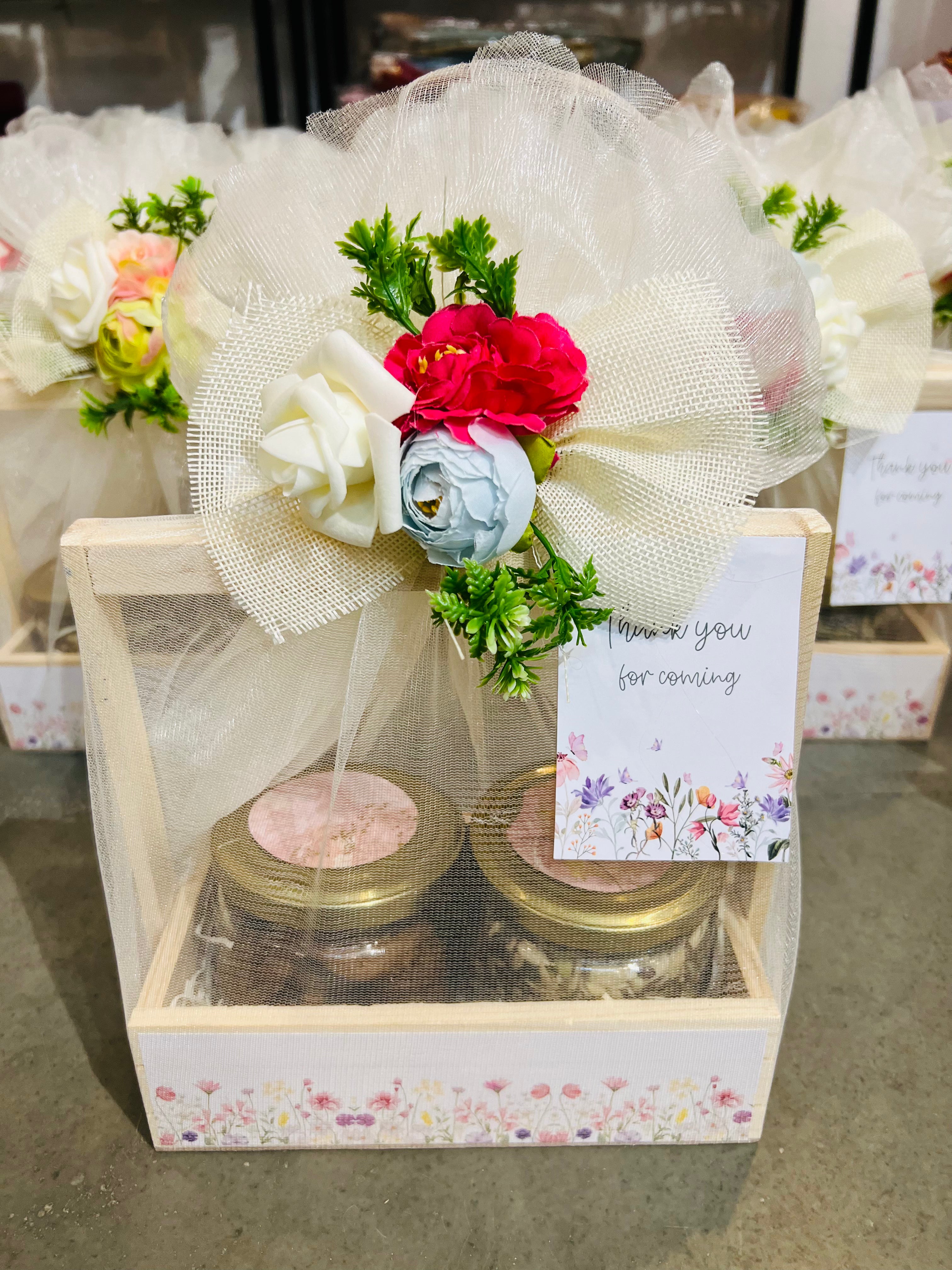 baby shower return gift hamper with cookies and 5 seeds mix in wooden basket