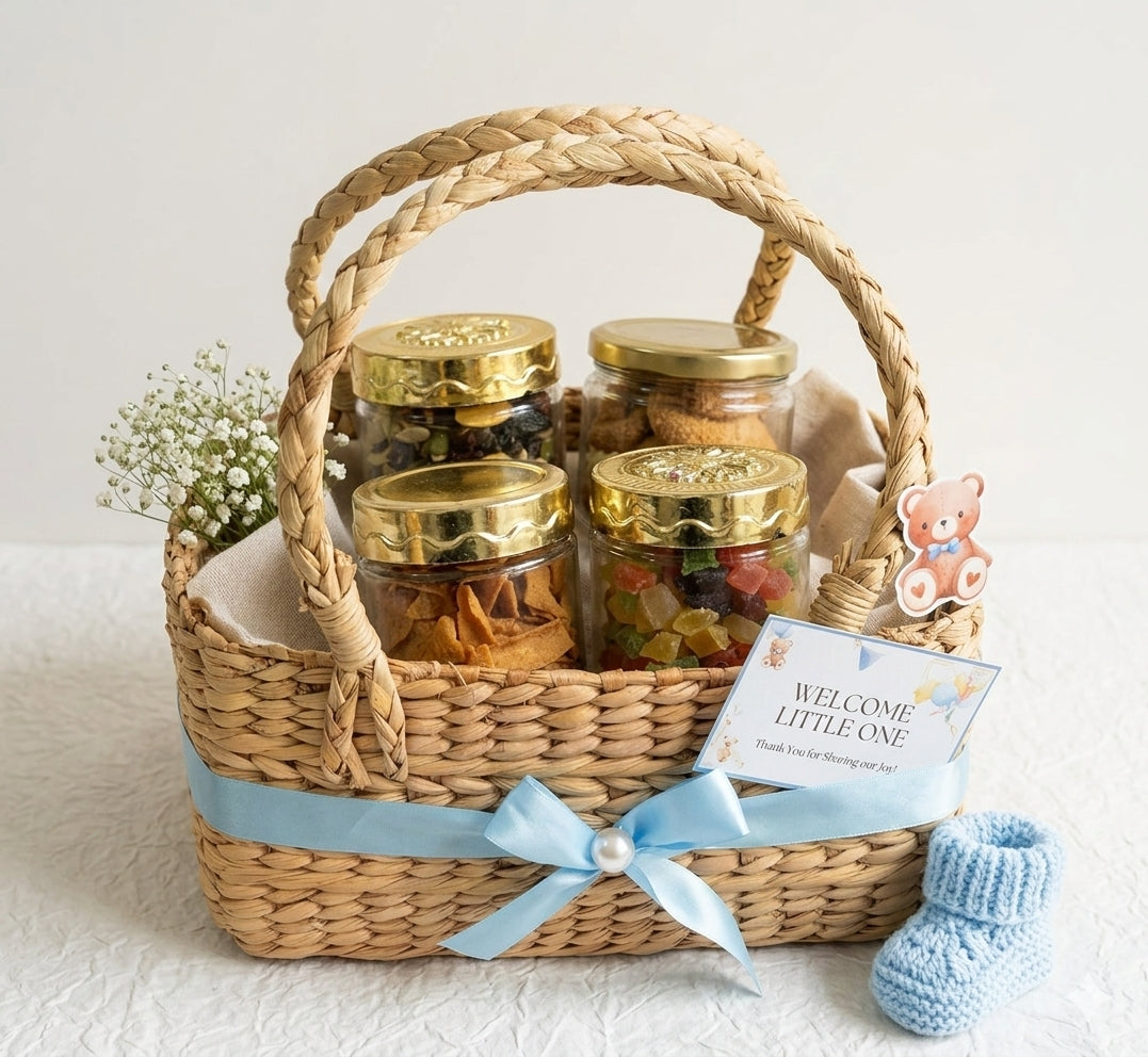 baby shower return gift hamper with cookies and dry fruits in kauna basket