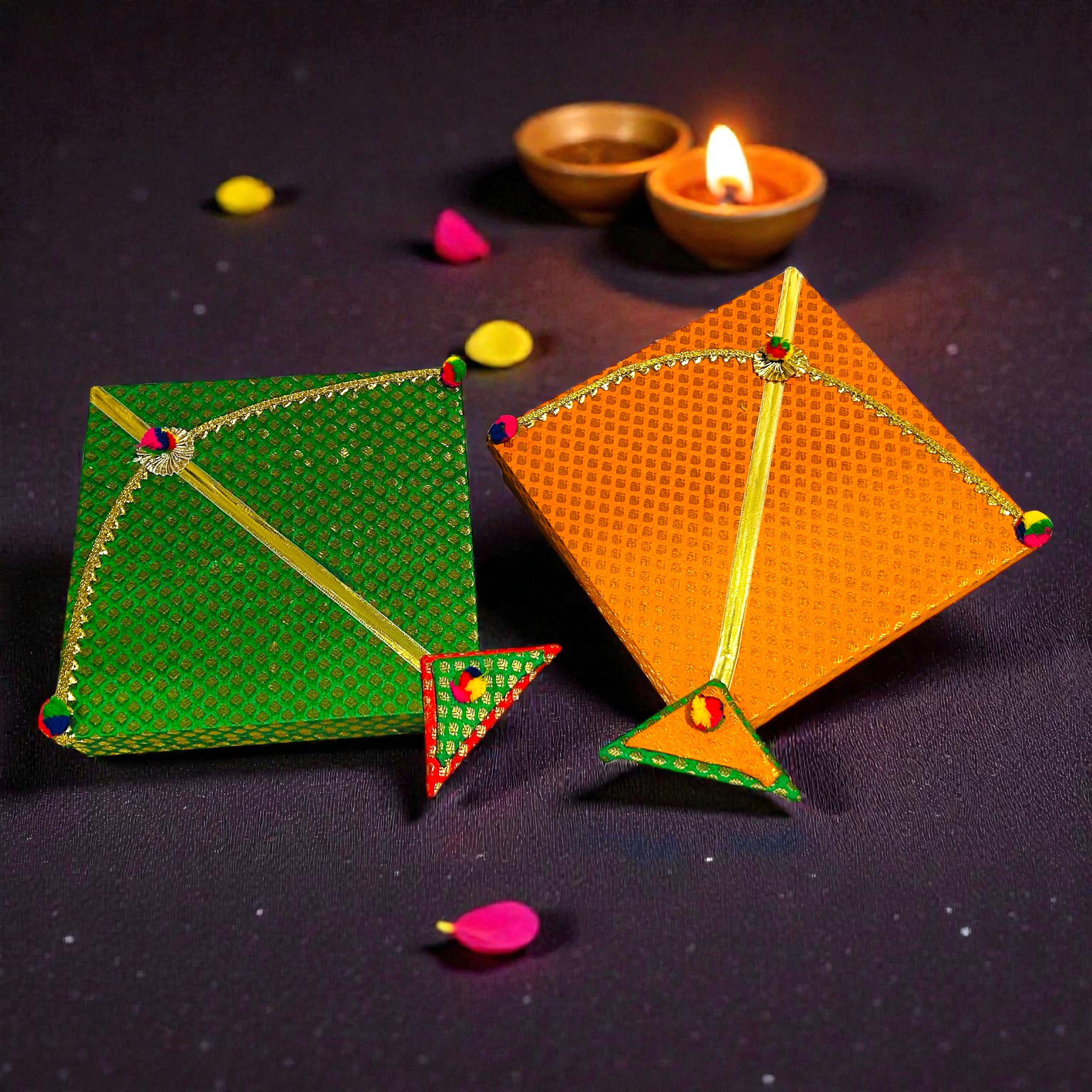 Festive Lohri hamper in kite shaped box with traditional snacks and velvet potli.