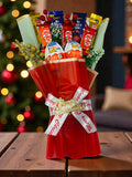 Christmas chocolate bouquet with KitKat, Kinder Joy, Dairy Milk and 5 Star chocolates.