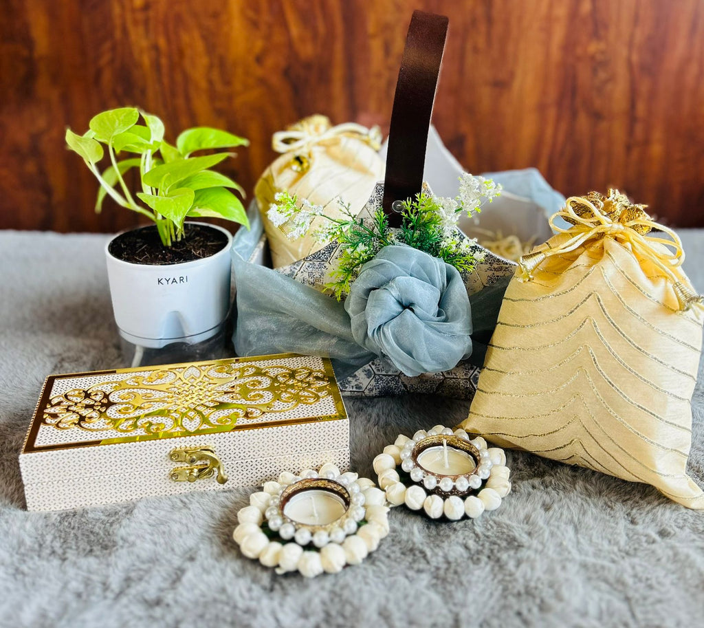 Premium Diwali hamper with coated almonds, cashews, chocolates, and tissue potlis