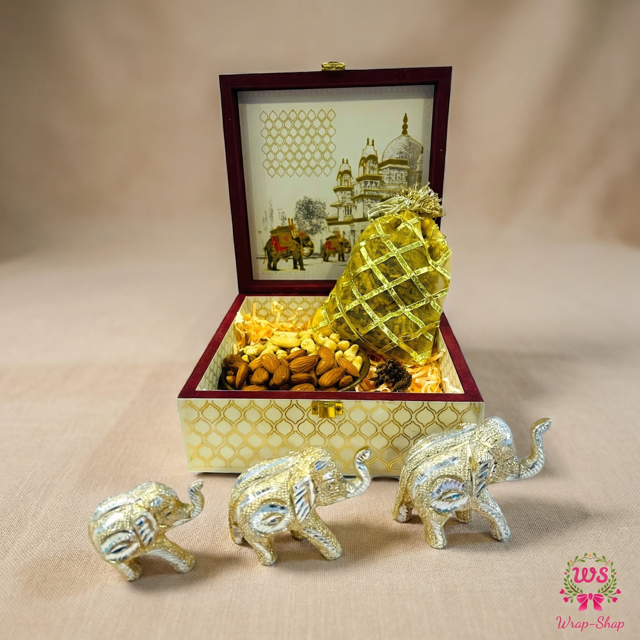 Premium wedding return gift hamper in elephant print wooden box with elephant showpieces and dry fruits